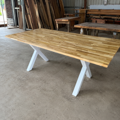 minimal teak table with white x-shape legs 1
