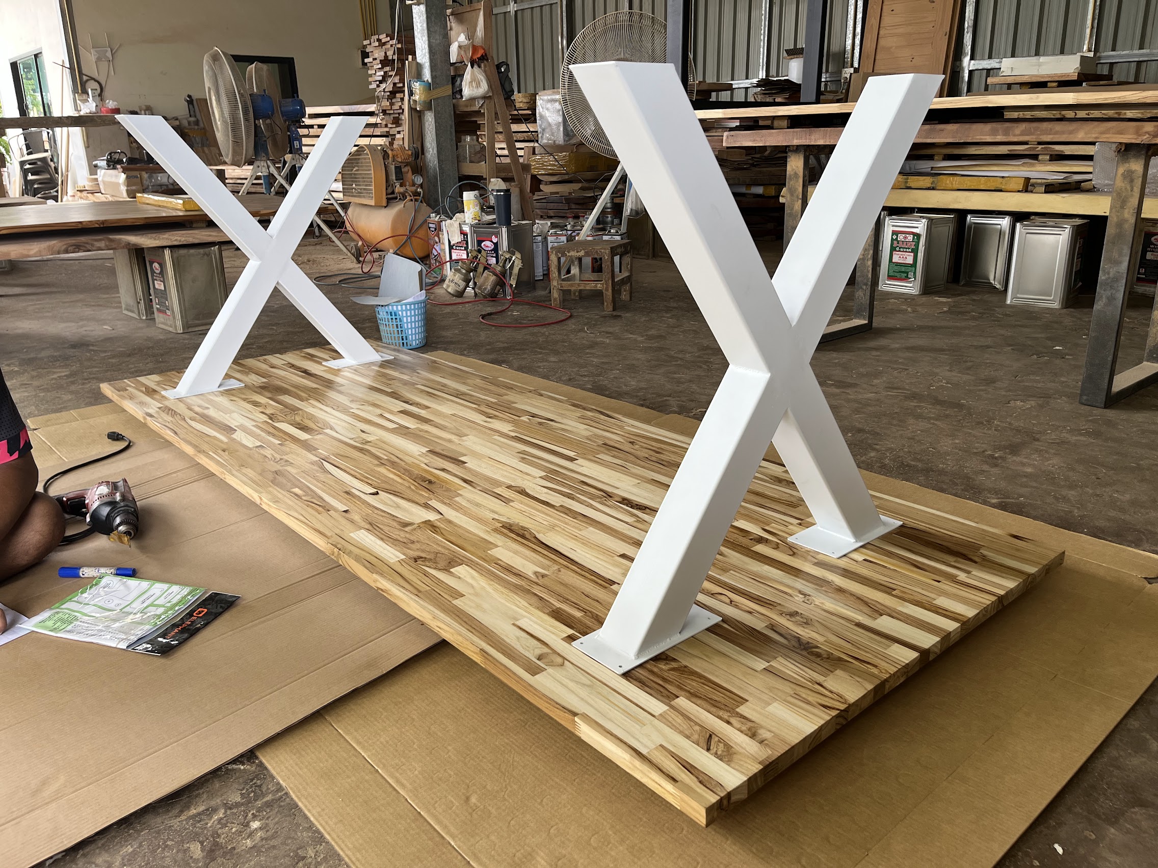 Custom jointed teak table by Blue Sea Wood before delivery
